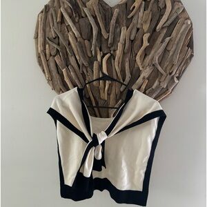 Black lined cream throw over